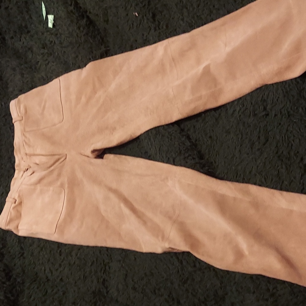 Find on the week. Neutral versatile leather pants in khaki. Made in fran…
